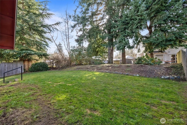 view of yard with fence