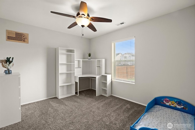 carpeted bedroom with a ceiling fan, baseboards, and visible vents