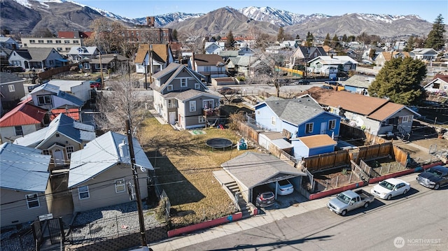 drone / aerial view with a residential view and a mountain view