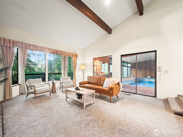 living room featuring carpet, a textured ceiling, high vaulted ceiling, and beam ceiling