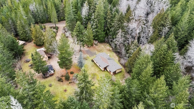 bird's eye view featuring a forest view