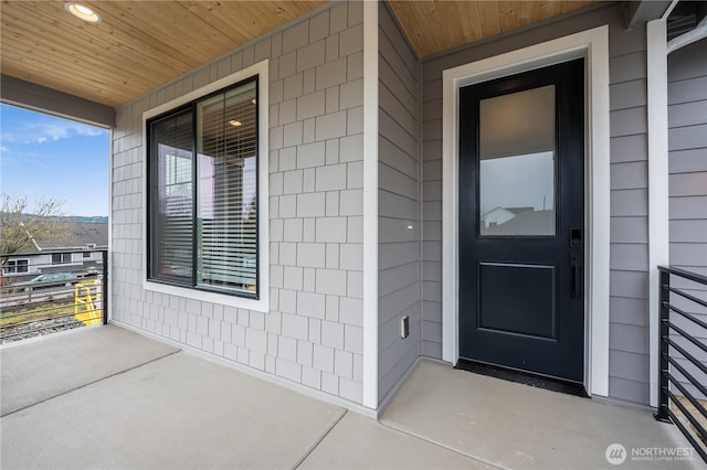 entrance to property with a porch