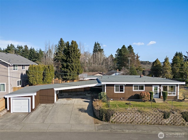 single story home with a carport and a front yard