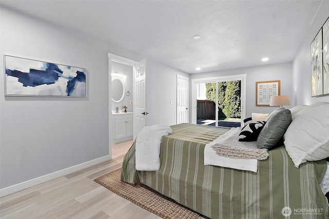 bedroom featuring baseboards, ensuite bath, access to exterior, light wood-style floors, and recessed lighting