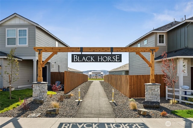 view of front of house with fence