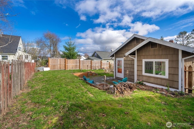 view of yard featuring a fenced backyard