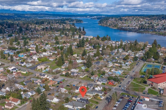 bird's eye view with a water view