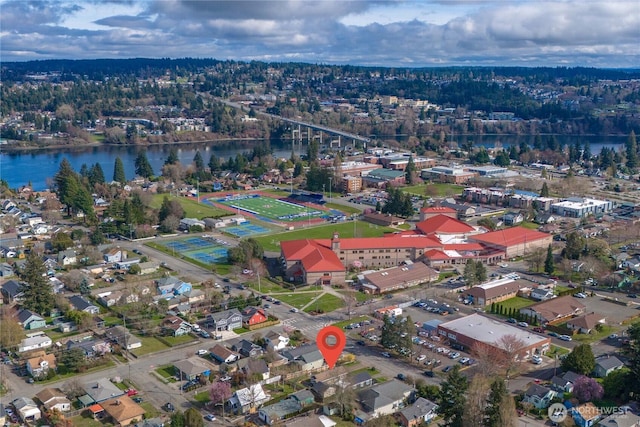 bird's eye view with a water view