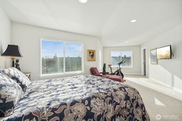 carpeted bedroom with recessed lighting and baseboards