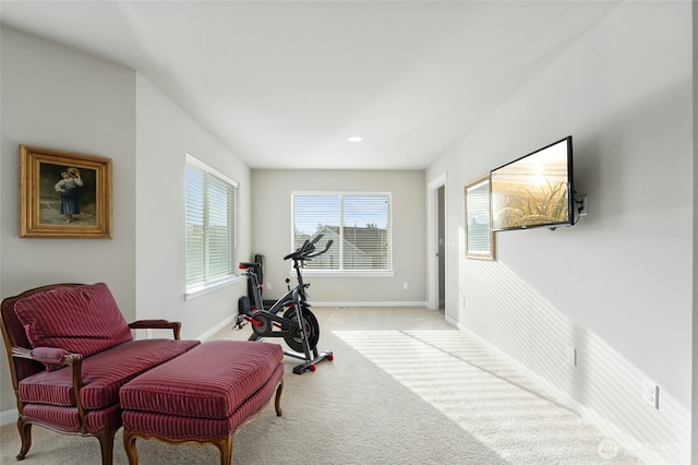 sitting room featuring carpet, baseboards, and recessed lighting