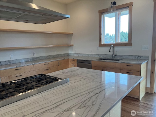 kitchen featuring dishwasher, range hood, stainless steel gas cooktop, open shelves, and a sink