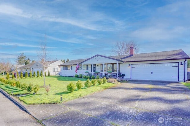 single story home with a garage, covered porch, driveway, and a front lawn