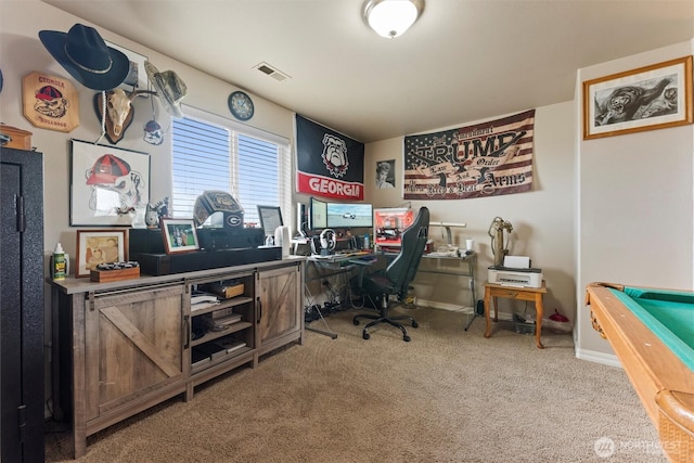 office with carpet flooring, visible vents, and baseboards