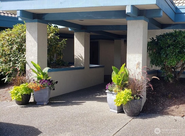 view of property exterior with stucco siding