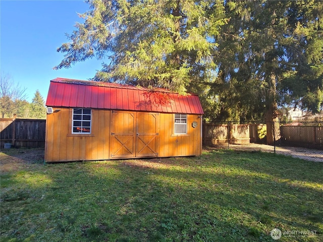 view of shed featuring a fenced backyard