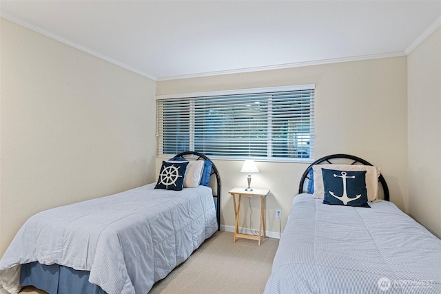 bedroom featuring baseboards, carpet floors, and crown molding