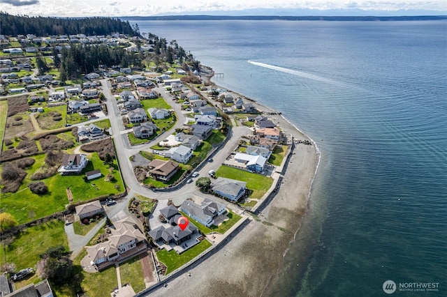 bird's eye view with a water view and a residential view