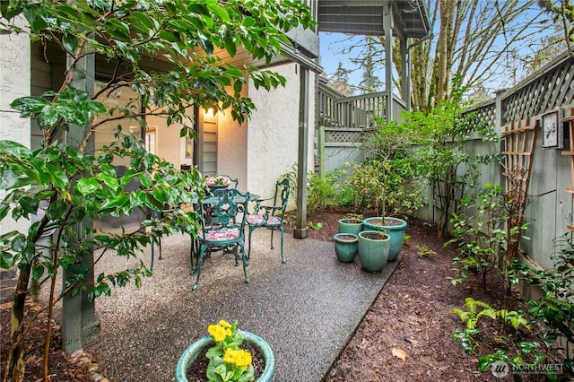 exterior space featuring a patio area and a fenced backyard