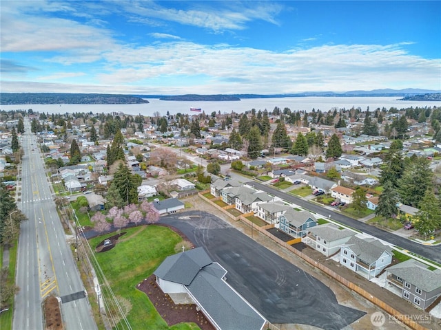 aerial view featuring a residential view and a water view