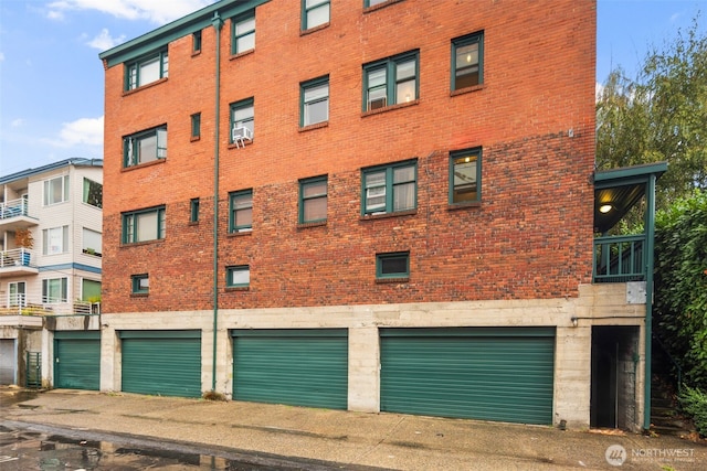 view of building exterior featuring a garage