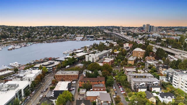 aerial view at dusk with a water view