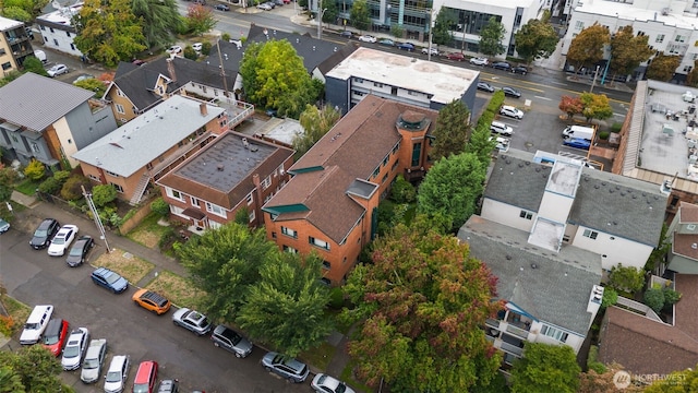 birds eye view of property with a residential view