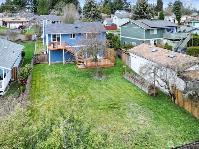 birds eye view of property with a residential view