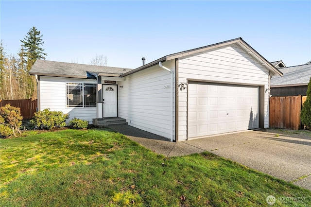 single story home featuring a front lawn, an attached garage, and fence