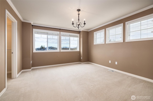 unfurnished room featuring ornamental molding, light colored carpet, visible vents, and an inviting chandelier