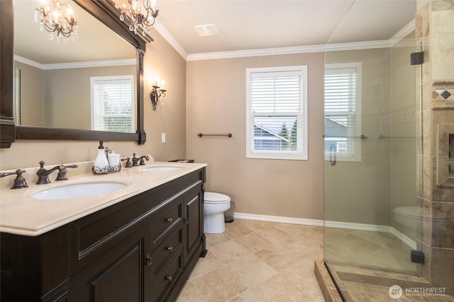 bathroom with a tile shower, a sink, and toilet