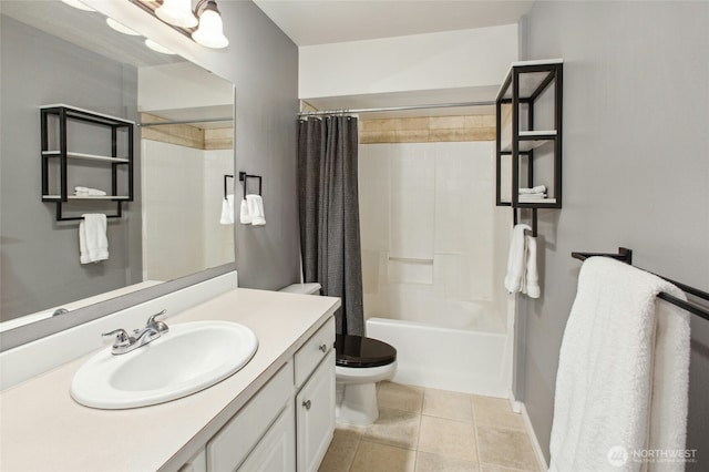 full bath featuring toilet, tile patterned flooring, shower / bath combo with shower curtain, and vanity