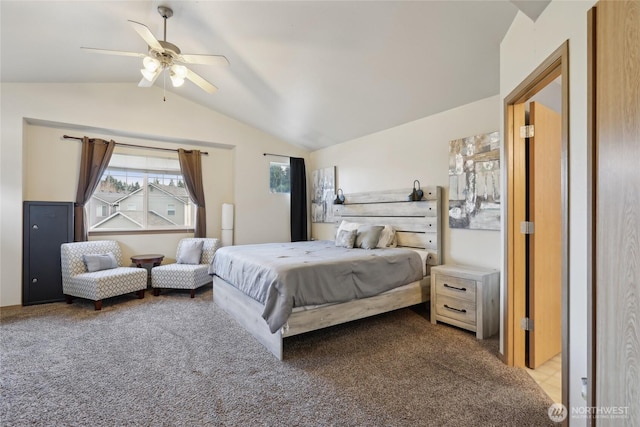 bedroom with lofted ceiling, carpet floors, and a ceiling fan