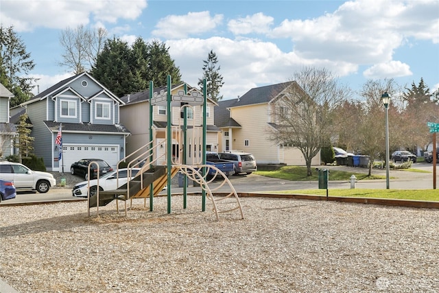 view of play area with a residential view