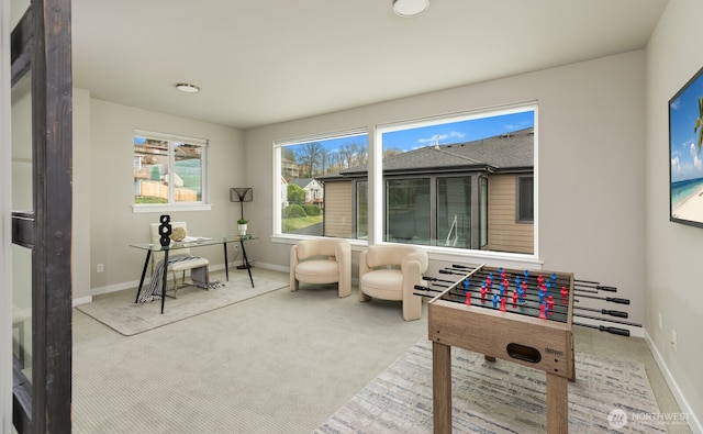 playroom featuring carpet and baseboards