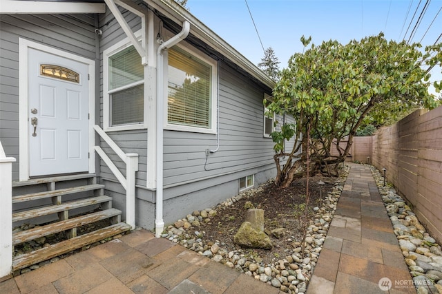 property entrance with fence