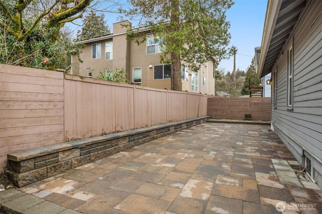 view of patio featuring a fenced backyard