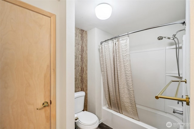 full bathroom with toilet and shower / tub combo