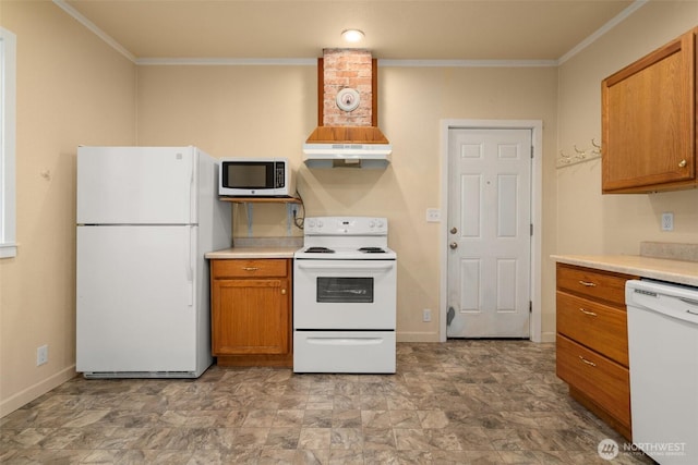 kitchen featuring ornamental molding, light countertops, white appliances, and brown cabinetry