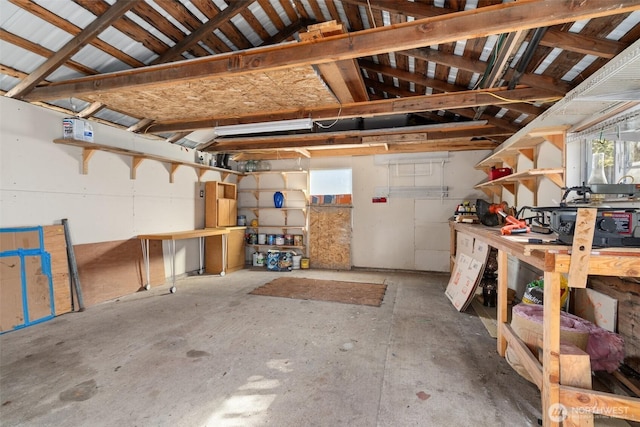 garage with a workshop area