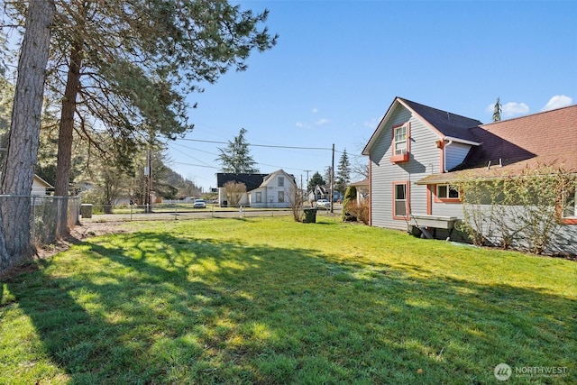 view of yard featuring fence