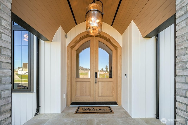 doorway to property featuring french doors