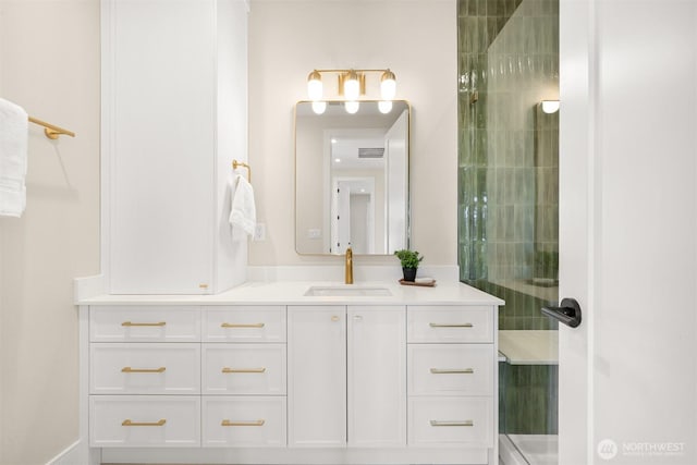 bathroom featuring visible vents and vanity