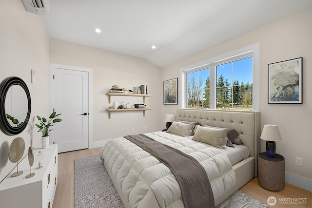 bedroom with a wall mounted air conditioner, light wood-type flooring, recessed lighting, baseboards, and lofted ceiling