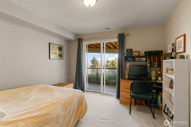 bedroom featuring carpet floors, access to outside, and visible vents