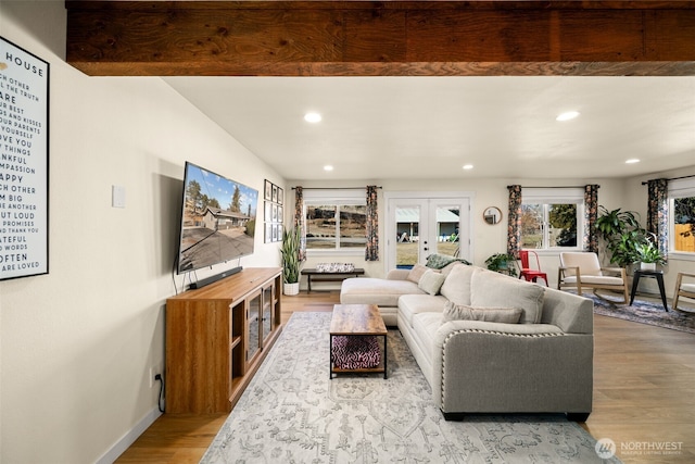 living room with french doors, recessed lighting, wood finished floors, and baseboards