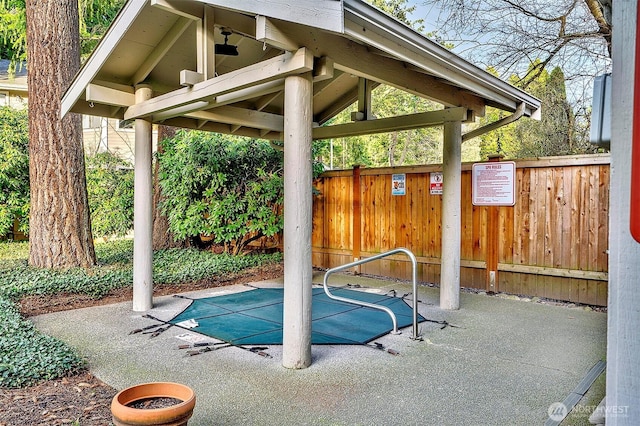 view of patio / terrace with a gazebo and fence