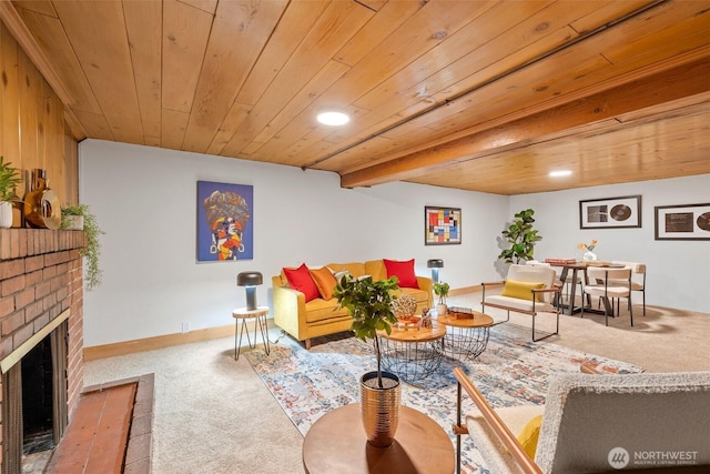 living area with a brick fireplace, wood ceiling, baseboards, and carpet flooring