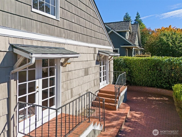 view of home's exterior with french doors