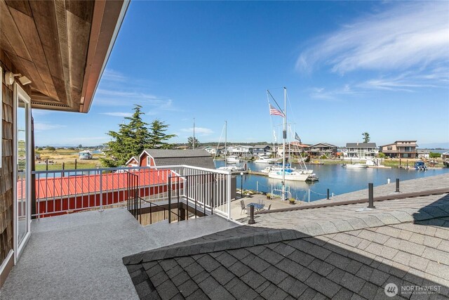 view of patio / terrace with a water view