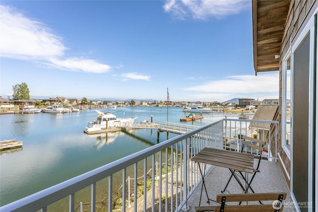 balcony featuring a water view